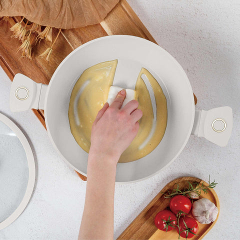 Product image of Casserole with lid 30cm. Part of the Sahara Collection . Features: • Material: forged aluminum with non-stick titanPro coating • Casserole with lid Ø30*13,5 cm 8L • Color: matt cream REGISTERED DESIGN BY BERLINGER .... (Studio view). Official Berlinger Haus product, boosted by Promintra sl.