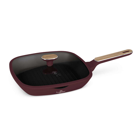 Product image of Grill pan with lid 28cm. Part of the Leonardo Nordic Collection . Features: • Material: forged aluminum with non-stick titanPro coating • Grill pan with lid Ø28*4,1 cm 2,1L • Color: matt bordeaux, wooden REGISTERED DESIGN B.... (Studio view). Official Berlinger Haus product, boosted by Promintra sl.