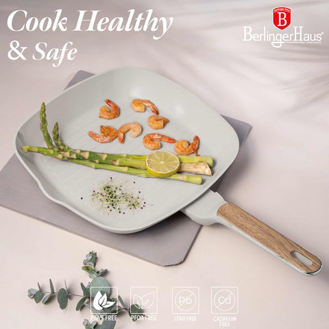 Product image of Grill pan 28cm. Part of the Sahara Nordic Collection . Features: • Material: forged aluminum with non-stick titanPro coating • Grill pan Ø28*4,1 cm 2,1L • Color: matt cream, wooden REGISTERED DESIGN BY BERLINGER .... (Giftbox view). Official Berlinger Haus product, boosted by Promintra sl.