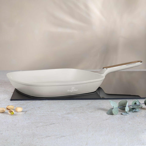 Product image of Grill pan 28cm. Part of the Sahara Nordic Collection . Features: • Material: forged aluminum with non-stick titanPro coating • Grill pan Ø28*4,1 cm 2,1L • Color: matt cream, wooden REGISTERED DESIGN BY BERLINGER .... (Giftbox view). Official Berlinger Haus product, boosted by Promintra sl.