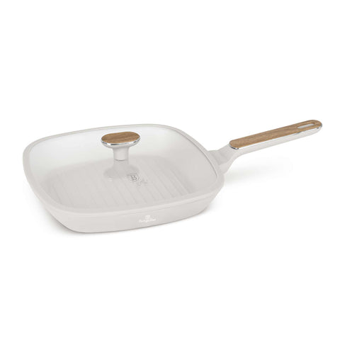 Product image of Grill pan with lid 28cm. Part of the Sahara Nordic Collection . Features: • Material: forged aluminum with non-stick titanPro coating • Grill pan with lid Ø28*4,1 cm 2,1L • Color: matt cream, wooden REGISTERED DESIGN BY B.... (Studio view). Official Berlinger Haus product, boosted by Promintra sl.