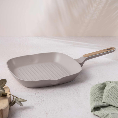 Product image of Grill pan 28cm. Part of the Taupe Nordic Collection . Features: • Material: forged aluminum with non-stick titanPro coating • Grill pan Ø28*4,1 cm 2,1L • Color: matt taupe, wooden REGISTERED DESIGN BY BERLINGER .... (Studio view). Official Berlinger Haus product, boosted by Promintra sl.