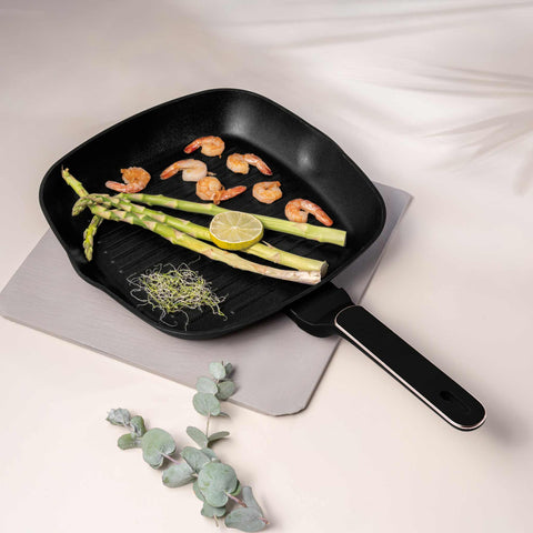Product image of Grill pan 28cm. Part of the Black Rose Collection . Features: • Material: forged aluminum with non-stick titanPro coating • Grill pan Ø28*4,1 cm 2,1L • Color: matt black- rose gold REGISTERED DESIGN BY BERLING.... (Studio view). Official Berlinger Haus product, boosted by Promintra sl.