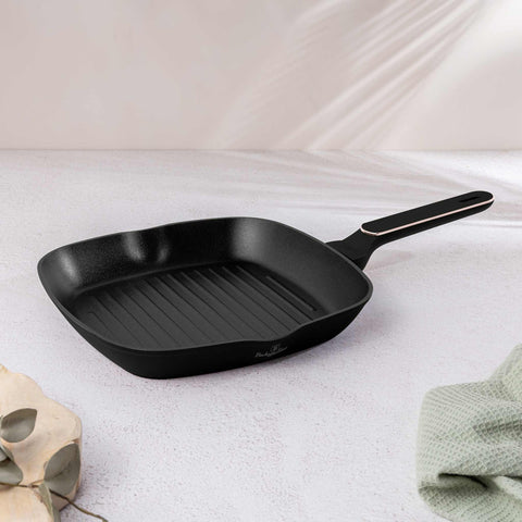 Product image of Grill pan 28cm. Part of the Black Rose Collection . Features: • Material: forged aluminum with non-stick titanPro coating • Grill pan Ø28*4,1 cm 2,1L • Color: matt black- rose gold REGISTERED DESIGN BY BERLING.... (Studio view). Official Berlinger Haus product, boosted by Promintra sl.