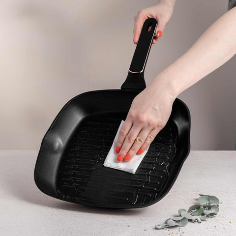 Product image of Grill pan 28cm. Part of the Black Rose Collection . Features: • Material: forged aluminum with non-stick titanPro coating • Grill pan Ø28*4,1 cm 2,1L • Color: matt black- rose gold REGISTERED DESIGN BY BERLING.... (Studio view). Official Berlinger Haus product, boosted by Promintra sl.