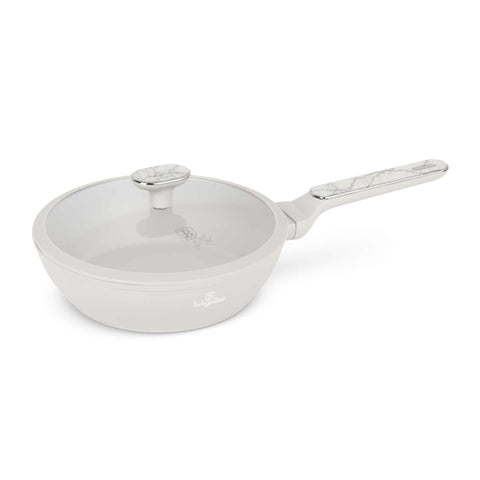 Product image of Deep frypan with lid 24cm. Part of the Sahara Marble Collection . Features: • Material: forged aluminum with non-stick titanPro coating • Deep frypan with lid Ø24*6,5 cm 2,3L • Color: matt cream, marble REGISTERED DESIGN BY.... (Studio view). Official Berlinger Haus product, boosted by Promintra sl.