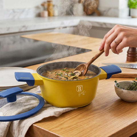 Product image of Mini casserole with lid 14cm. Part of the Minions Collection . Features: • Material: forged aluminum with non-stick titanPro coating • Casserole with lid Ø14 cm • Color: yellow- blue. (Studio view). Official Berlinger Haus product, boosted by Promintra sl.