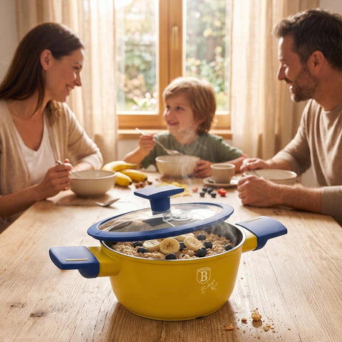 Product image of Mini casserole with lid 16cm. Part of the Minions Collection . Features: • Material: forged aluminum with non-stick titanPro coating • Casserole with lid Ø16 cm • Color: yellow- blue. (Studio view). Official Berlinger Haus product, boosted by Promintra sl.