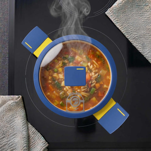 Product image of Mini casserole with lid 20cm. Part of the Minions Collection . Features: • Material: forged aluminum with non-stick titanPro coating • Casserole with lid Ø20 cm • Color: yellow- blue. (Studio view). Official Berlinger Haus product, boosted by Promintra sl.