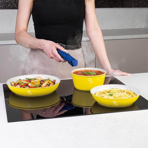 Product image of 4pcs cookware set. Part of the Minions Collection . Features: • Material: forged aluminum with non-stick titanPro coating • Include: • STACKABLE - SPACE SAVING • Frypan Ø20 cm • Frypan Ø24 cm • Sauce pan Ø16 c.... (Studio view). Official Berlinger Haus product, boosted by Promintra sl.