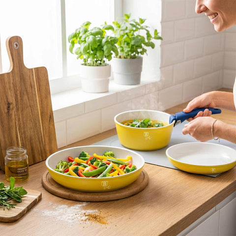 Product image of 4pcs cookware set. Part of the Minions Collection . Features: • Material: forged aluminum with non-stick titanPro coating • Include: • STACKABLE - SPACE SAVING • Frypan Ø20 cm • Frypan Ø24 cm • Sauce pan Ø16 c.... (Studio view). Official Berlinger Haus product, boosted by Promintra sl.