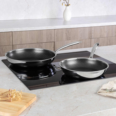 Product image of 2pcs frypan set. Part of the Eternal Collection . Features: • Material: stainless steel with laser-cut surface • Include: • Frypan Ø24*5 cm 1,7L • Frypan Ø28*5,5 cm 2,4L REGISTERED DESIGN BY BERLINGER HAUS!. (Studio view). Official Berlinger Haus product, boosted by Promintra sl.