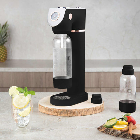 Product image of Soda maker with 2bottles and barometer universal CO2cylinders size. Part of the Black Rose Collection . Features: • Material: stainless steel, pp • Size: 43,5*22*12 cm • 2 pcs pp bottle with cup: 1,0L and 0,5L • Universal, standard CO2 cylinders size (not inclu.... (Studio view). Official Berlinger Haus product, boosted by Promintra sl.
