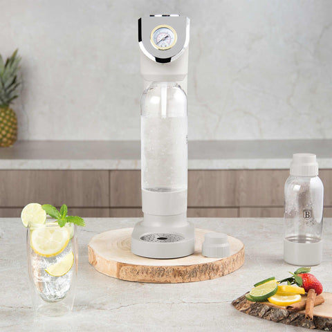 Product image of Soda maker with 2bottles and barometer universal CO2cylinders size. Part of the Sahara Collection . Features: • Material: stainless steel, pp • Size: 43,5*22*12 cm • 2 pcs pp bottle with cup: 1,0L and 0,5L • Universal, standard CO2 cylinders size (not inclu.... (Studio view). Official Berlinger Haus product, boosted by Promintra sl.
