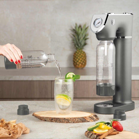 Product image of Soda maker with 2bottles and barometer universal CO2cylinders size. Part of the Anthracite Collection . Features: • Material: stainless steel, pp • Size: 43,5*22*12 cm • 2 pcs pp bottle with cup: 1,0L and 0,5L • Universal, standard CO2 cylinders size (not inclu.... (Studio view). Official Berlinger Haus product, boosted by Promintra sl.