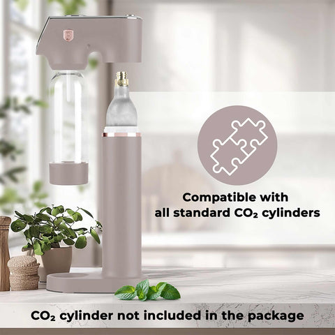 Product image of Soda maker with 2bottles and barometer universal CO2cylinders size. Part of the Taupe Collection . Features: • Material: stainless steel, pp • Size: 43,5*22*12 cm • 2 pcs pp bottle with cup: 1,0L and 0,5L • Universal, standard CO2 cylinders size (not inclu.... (Studio view). Official Berlinger Haus product, boosted by Promintra sl.