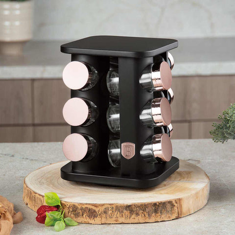 Product image of 13pcs square spice rack black- rose gold. Part of the Black Rose Collection . Features: • Size: 18,5*18,5*21,5 cm • Include: • 12 pcs glass spice jar • Capacity: 90 ml • 360° rotatable stand • Color: black- rose gold. (Studio view). Official Berlinger Haus product, boosted by Promintra sl.
