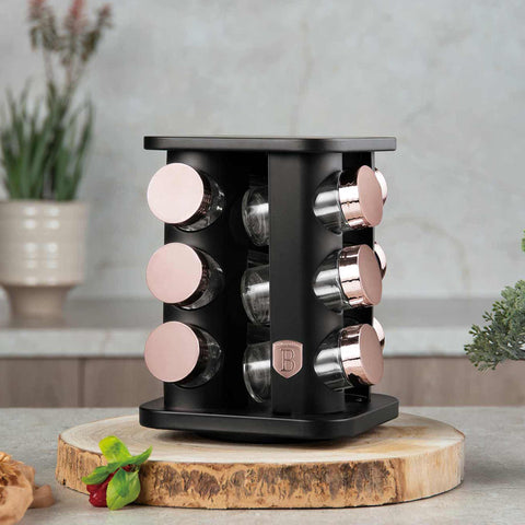 Product image of 13pcs square spice rack black- rose gold. Part of the Black Rose Collection . Features: • Size: 18,5*18,5*21,5 cm • Include: • 12 pcs glass spice jar • Capacity: 90 ml • 360° rotatable stand • Color: black- rose gold. (Studio view). Official Berlinger Haus product, boosted by Promintra sl.