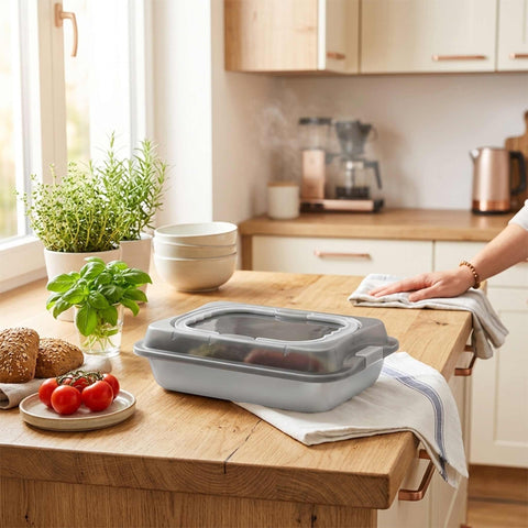 Product image of Oblong roaster with lid. Part of the Aspen Collection . Features: • Material: carbon steel with titanPro non-stick coating, plastic cover • Size: 36,5*24,5*5,5 cm • Color: matt grey. (Studio view). Official Berlinger Haus product, boosted by Promintra sl.