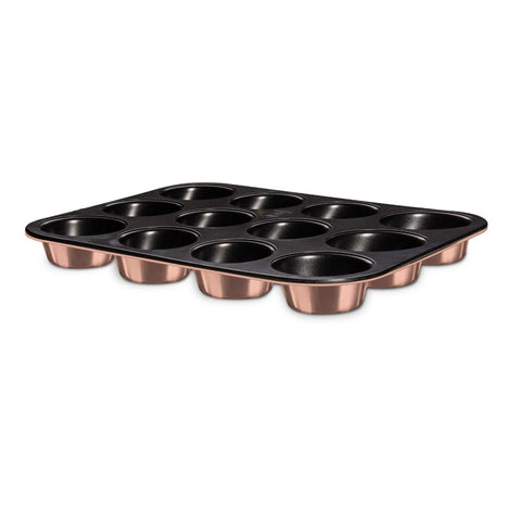 Product image of 12cups muffin pan. Part of the Metallic Line Rose Gold Edition . Features: • Material: carbon steel with titan non-stick coating • Size: 35*26,5*3 cm • Color: metallic rose gold. (Studio view). Official Berlinger Haus product, boosted by Promintra sl.