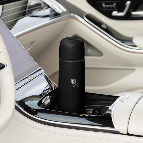 Product image of Vacuum flask 0,75L. Part of the Matte Black Collection . Features: • Material: inner body 18/10 stainless steel with matt powder coating • Capacity: 0,75 L • Color: black- silver • Packing: half giftbox. (Studio view). Official Berlinger Haus product, boosted by Promintra sl.