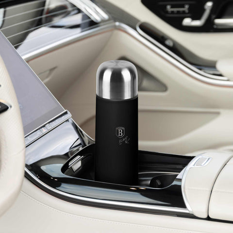 Product image of Vacuum flask 0,75L. Part of the Matte Black Collection . Features: • Material: inner body 18/10 stainless steel with matt powder coating • Capacity: 0,75 L • Color: black- silver • Packing: half giftbox. (Studio view). Official Berlinger Haus product, boosted by Promintra sl.