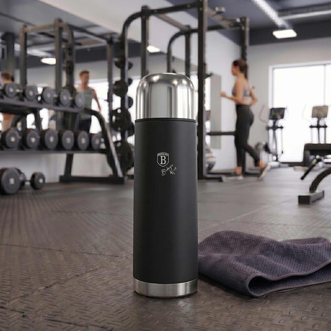 Product image of Vacuum flask 0,75L. Part of the Matte Black Collection . Features: • Material: inner body 18/10 stainless steel with matt powder coating • Capacity: 0,75 L • Color: black- silver • Packing: half giftbox. (Studio view). Official Berlinger Haus product, boosted by Promintra sl.