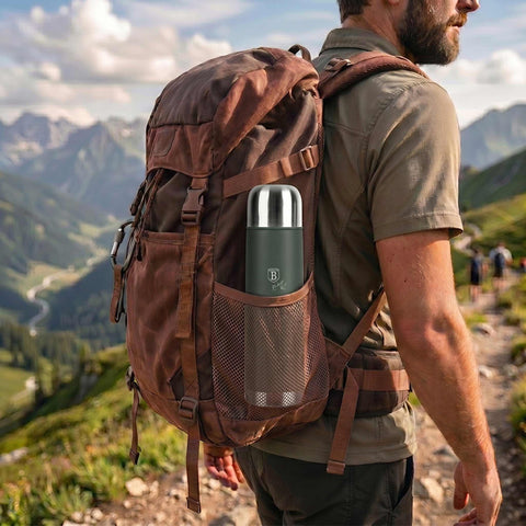 Product image of Vacuum flask 1,0L. Part of the Matte Green Collection . Features: • Material: inner body 18/10 stainless steel with matt powder coating • Capacity: 1,0 L • Color: matt green • Packing: half giftbox. (Studio view). Official Berlinger Haus product, boosted by Promintra sl.