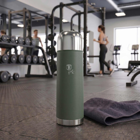Product image of Vacuum flask 1,0L. Part of the Matte Green Collection . Features: • Material: inner body 18/10 stainless steel with matt powder coating • Capacity: 1,0 L • Color: matt green • Packing: half giftbox. (Studio view). Official Berlinger Haus product, boosted by Promintra sl.