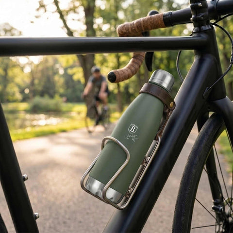 Product image of Vacuum flask bottle shape 0,5L. Part of the Matte Green Collection . Features: • Material: inner body 18/10 stainless steel with matt powder coating • Capacity: 0,5 L • Color: matt green • Packing: half giftbox. (Studio view). Official Berlinger Haus product, boosted by Promintra sl.