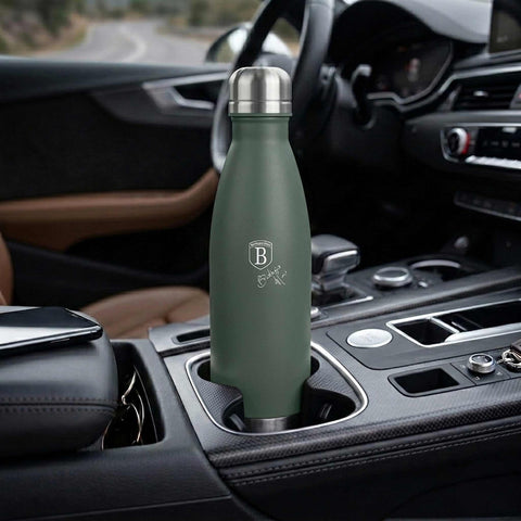 Product image of Vacuum flask bottle shape 0,5L. Part of the Matte Green Collection . Features: • Material: inner body 18/10 stainless steel with matt powder coating • Capacity: 0,5 L • Color: matt green • Packing: half giftbox. (Studio view). Official Berlinger Haus product, boosted by Promintra sl.