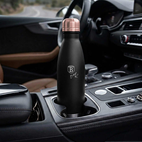 Product image of Vacuum flask bottle shape 0,5L. Part of the Black Rose Collection . Features: • Material: inner body 18/10 stainless steel with matt powder coating • Capacity: 0,5 L • Color: matt black- rose gold • Packing: half giftbox. (Studio view). Official Berlinger Haus product, boosted by Promintra sl.