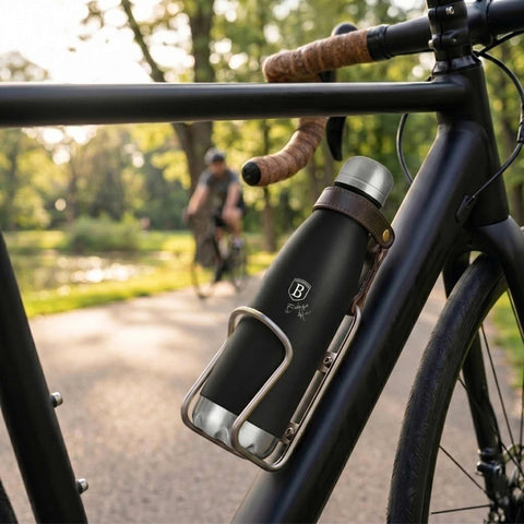 Product image of Vacuum flask bottle shape 0,5L. Part of the Matte Black Collection . Features: • Material: inner body 18/10 stainless steel with matt powder coating • Capacity: 0,5 L • Color: black- silver • Packing: half giftbox. (Studio view). Official Berlinger Haus product, boosted by Promintra sl.