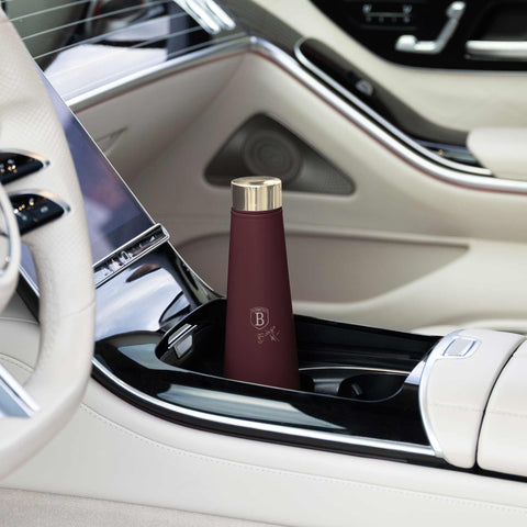 Product image of Vacuum flask bottle shape 0,4L. Part of the Leonardo Collection . Features: • Material: inner body 18/10 stainless steel with matt powder coating • Capacity: 0,4 L • Color: matt bordeaux • Packing: half giftbox. (Studio view). Official Berlinger Haus product, boosted by Promintra sl.