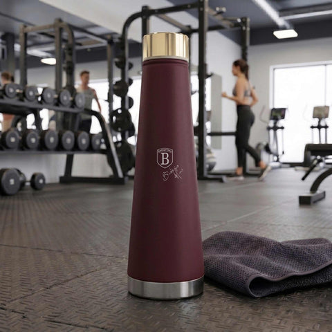 Product image of Vacuum flask bottle shape 0,4L. Part of the Leonardo Collection . Features: • Material: inner body 18/10 stainless steel with matt powder coating • Capacity: 0,4 L • Color: matt bordeaux • Packing: half giftbox. (Studio view). Official Berlinger Haus product, boosted by Promintra sl.