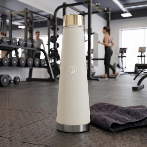 Product image of Vacuum flask bottle shape 0,4L. Part of the Sahara Collection . Features: • Material: inner body 18/10 stainless steel with matt powder coating • Capacity: 0,4 L • Color: matt cream • Packing: half giftbox. (Studio view). Official Berlinger Haus product, boosted by Promintra sl.