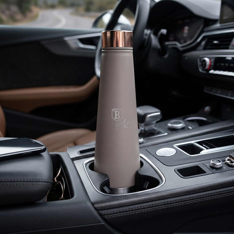 Product image of Vacuum flask bottle shape 0,4L. Part of the Taupe Collection . Features: • Material: inner body 18/10 stainless steel with matt powder coating • Capacity: 0,4 L • Color: matt taupe • Packing: half giftbox. (Studio view). Official Berlinger Haus product, boosted by Promintra sl.