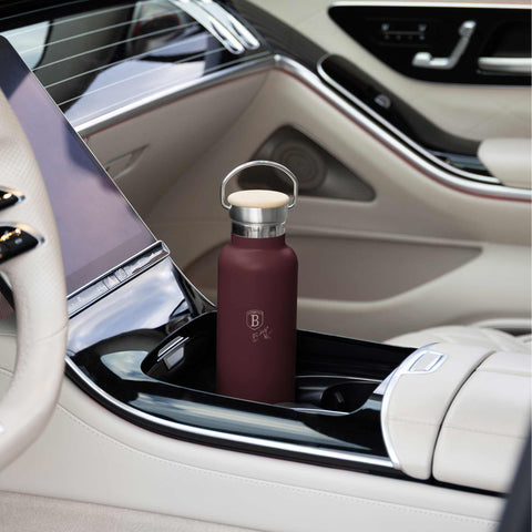 Product image of Flask with bamboo lid 0,6L. Part of the Leonardo Collection . Features: • Material: 18/10 stainless steel with matt powder coating • Bamboo lid • Capacity: 0,6 L • Color: matt bordeaux • Packing: giftbox. (Studio view). Official Berlinger Haus product, boosted by Promintra sl.