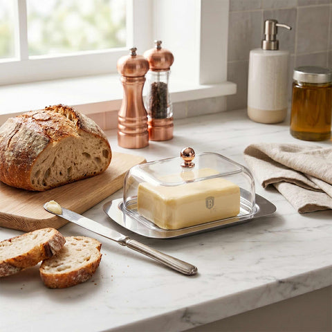 Product image of Butter dish with lid. Part of the Metallic Line Rose Gold Edition . Features: • Material: stainless steel, plastic • Size: 18,7*12,3*7,8 cm. (Conceptual view). Official Berlinger Haus product, boosted by Promintra sl.