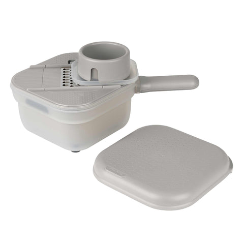 Product image of Multifunctional slicer. Part of the Sahara Collection . Features: • Material: stainless steel, plastic • Capacity: 1,5 L • Size: 18*18*11,5 cm • With 3 different blades • Color: cream. (Studio view). Official Berlinger Haus product, boosted by Promintra sl.