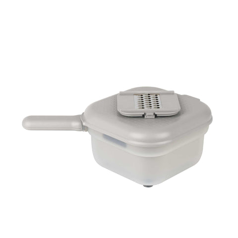 Product image of Multifunctional slicer. Part of the Sahara Collection . Features: • Material: stainless steel, plastic • Capacity: 1,5 L • Size: 18*18*11,5 cm • With 3 different blades • Color: cream. (Studio view). Official Berlinger Haus product, boosted by Promintra sl.