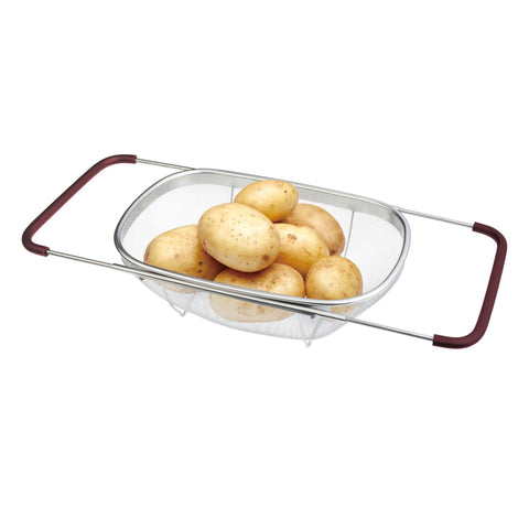 Product image of Flexible mesh basket with adjustable handles. Part of the kitchen accessories . Features: • Material: 18/10 stainless steel • Size: 34*24*11 cm. (Studio view). Official Berlinger Haus product, boosted by Promintra sl.