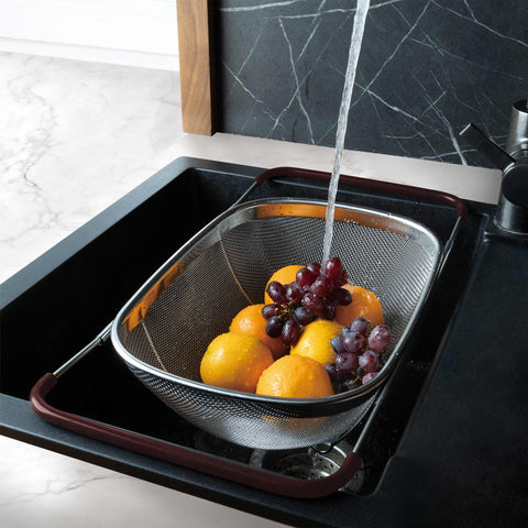 Product image of Flexible mesh basket with adjustable handles. Part of the kitchen accessories . Features: • Material: 18/10 stainless steel • Size: 34*24*11 cm. (Studio view). Official Berlinger Haus product, boosted by Promintra sl.