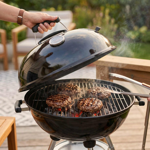 Product image of Kettle grill. Part of the outdoor . Features: • Material: steel, chrome, aluminium • Size: 61,5*48*86 cm • Accessories, features: • Enamel coated firebowl Ø47 cm • Cooking grid with handle Ø44,.... (Studio view). Official Berlinger Haus product, boosted by Promintra sl.