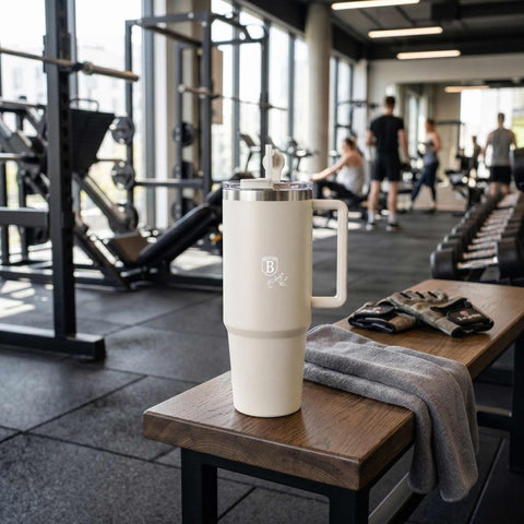 Product image of Thermo mug 1L. Part of the Sahara Collection . Features: • Material: 18/10 stainless steel, cap: plastic, with matt powder coating • Capacity: 1 L • Accessories: • 30 cm straw • Color: matt cream • Packin.... (Studio view). Official Berlinger Haus product, boosted by Promintra sl.