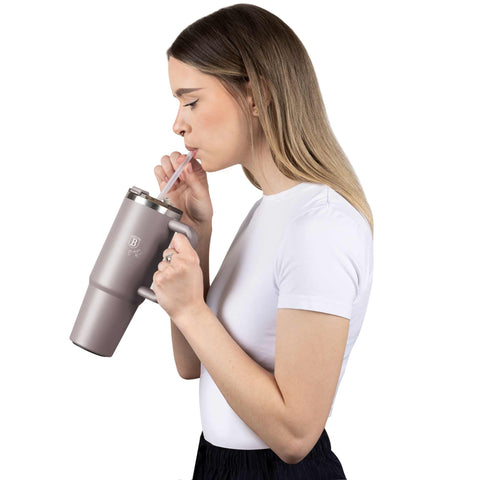 Product image of Thermo mug 1L. Part of the Taupe Collection . Features: • Material: 18/10 stainless steel, cap: plastic, with matt powder coating • Capacity: 1 L • Accessories: • 30 cm straw • Color: matt taupe • Packin.... (Studio view). Official Berlinger Haus product, boosted by Promintra sl.
