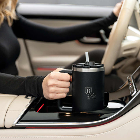 Product image of Thermo mug 1L. Part of the Matte Black Collection . Features: • Material: 18/10 stainless steel, cap: plastic, with matt powder coating • Capacity: 1 L • Accessories: • 30 cm straw • Color: black • Packing: ha.... (Studio view). Official Berlinger Haus product, boosted by Promintra sl.