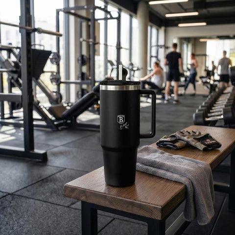 Product image of Thermo mug 1L. Part of the Matte Black Collection . Features: • Material: 18/10 stainless steel, cap: plastic, with matt powder coating • Capacity: 1 L • Accessories: • 30 cm straw • Color: black • Packing: ha.... (Studio view). Official Berlinger Haus product, boosted by Promintra sl.