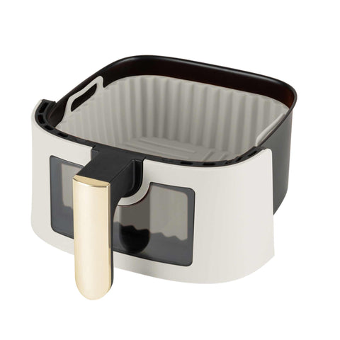 Product image of Silicone air fryer basket. Part of the Sahara Collection . Features: • Air fryer basket • Material: silicone • Size: 21*21*9 cm • Color: cream. (Studio view). Official Berlinger Haus product, boosted by Promintra sl.