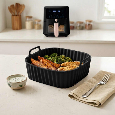 Product image of Silicone air fryer basket. Part of the Black Vantage Collection/Matte Black Collection/Black Silver Collection . Features: • Air fryer basket • Material: silicone • Size: 21*21*9 cm • Color: black. (Studio view). Official Berlinger Haus product, boosted by Promintra sl.